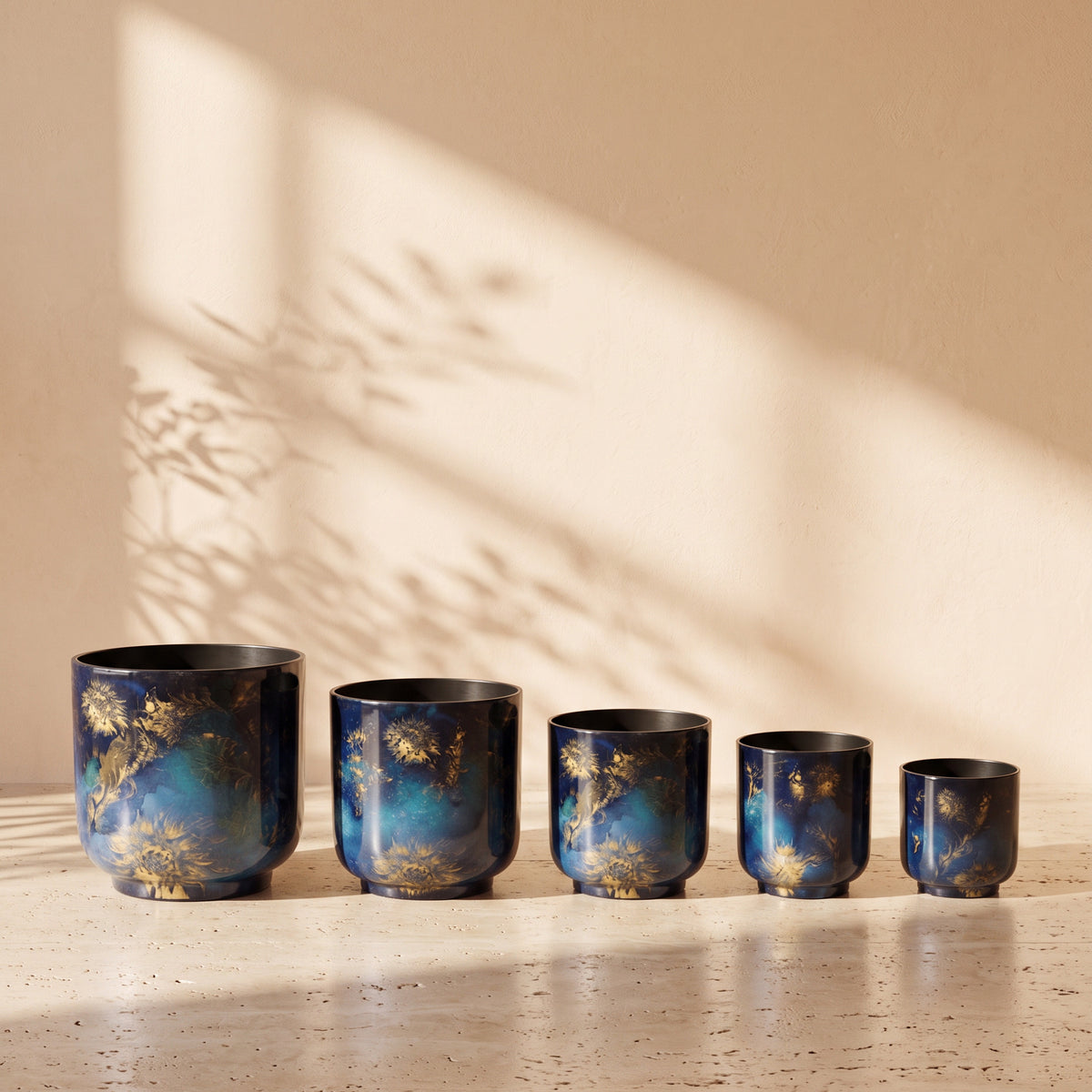 Botanica Printed Metal Pot in Dark Leafy Blue, all sizes shown together