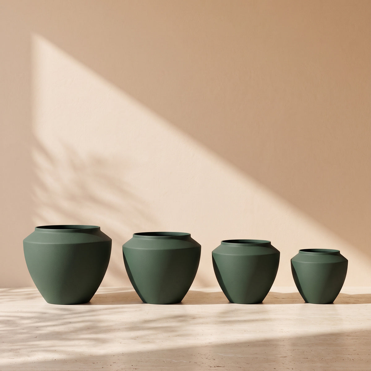 Urban Aura Stone Texture Metal Pot in Dark Green, all sizes shown together