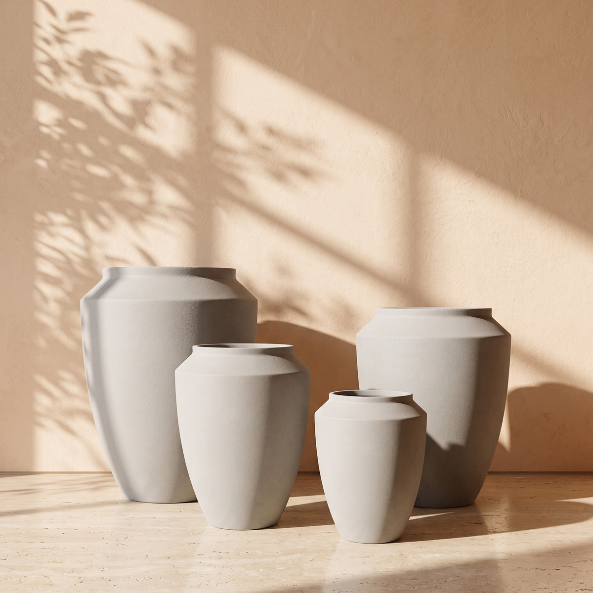 Urban Stone Texture Metal Pot in Concrete, all sizes shown together