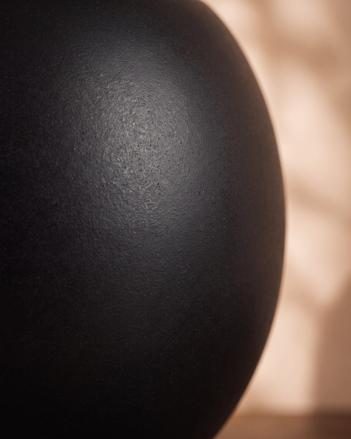 Matt Black Globe, close-up of the surface texture