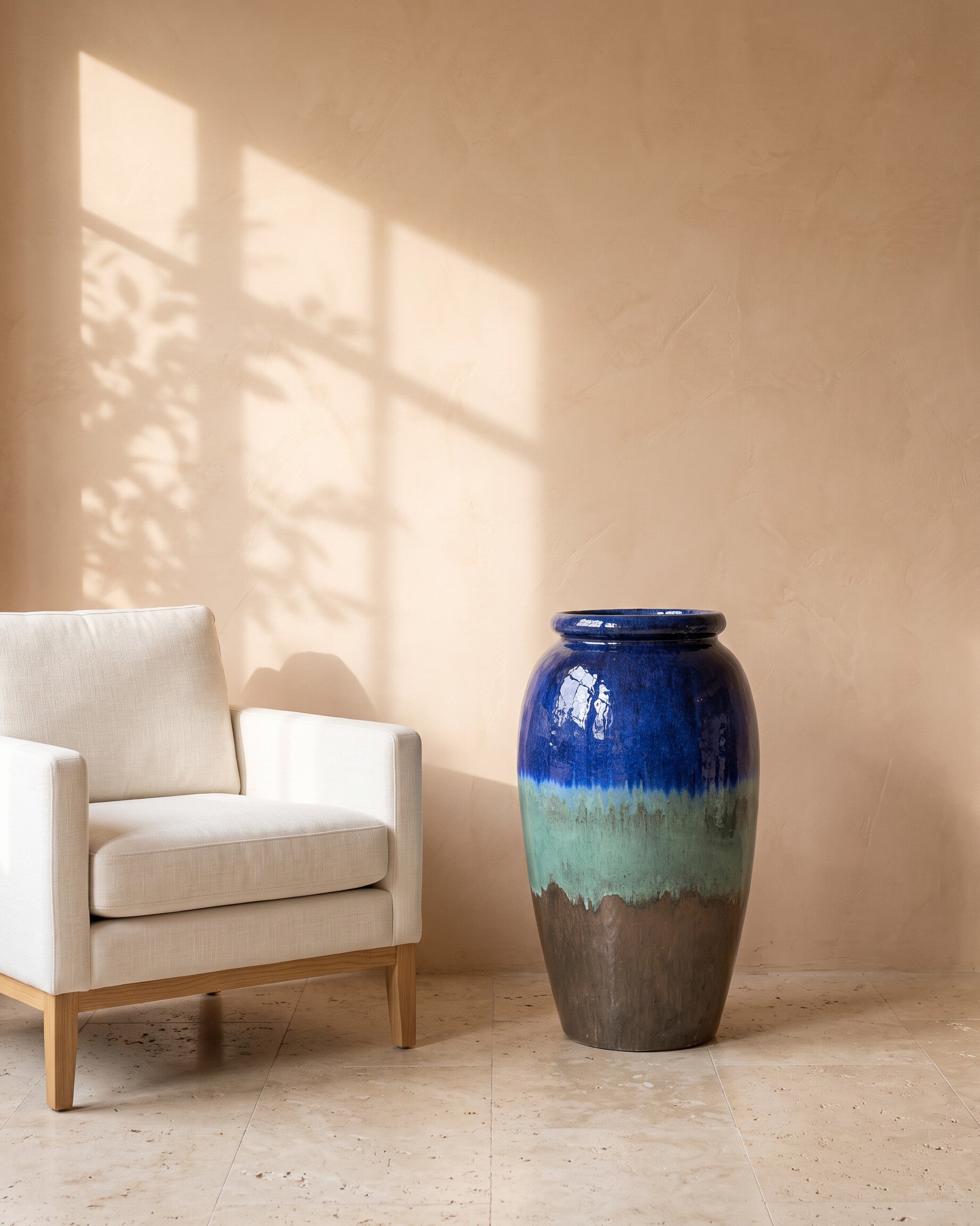 Luxe Jar, shown beside a linen armchair for scale