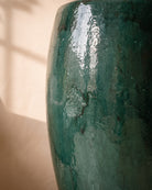 Dark Green Glossy Pot, close-up of the glaze texture