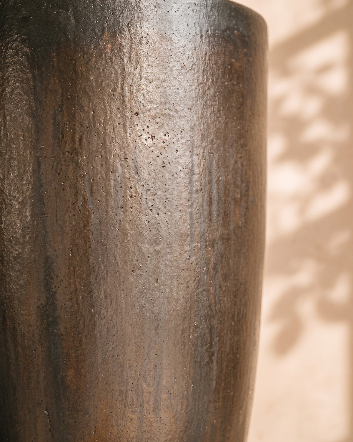 Metallic Charcoal Elongated Pot, close-up of the glaze texture