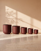 Classic Leather Texture Metal Pot in Maroon, all sizes shown together