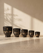 Pedestal Black Printed Metal Pot, all sizes shown together