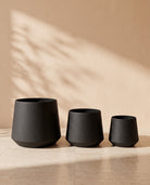 Royal Leather Texture Metal Pot in Black, all sizes shown together