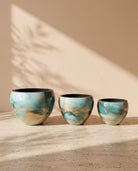 Sphere Marble Print Metal Pot in Sky Blue, all sizes shown together