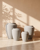 Urban Stone Texture Metal Pot in Concrete, all sizes shown together
