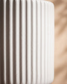 Linear Pot, close-up of the surface texture in white