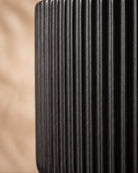 Linear Pot, close-up of the surface texture in black