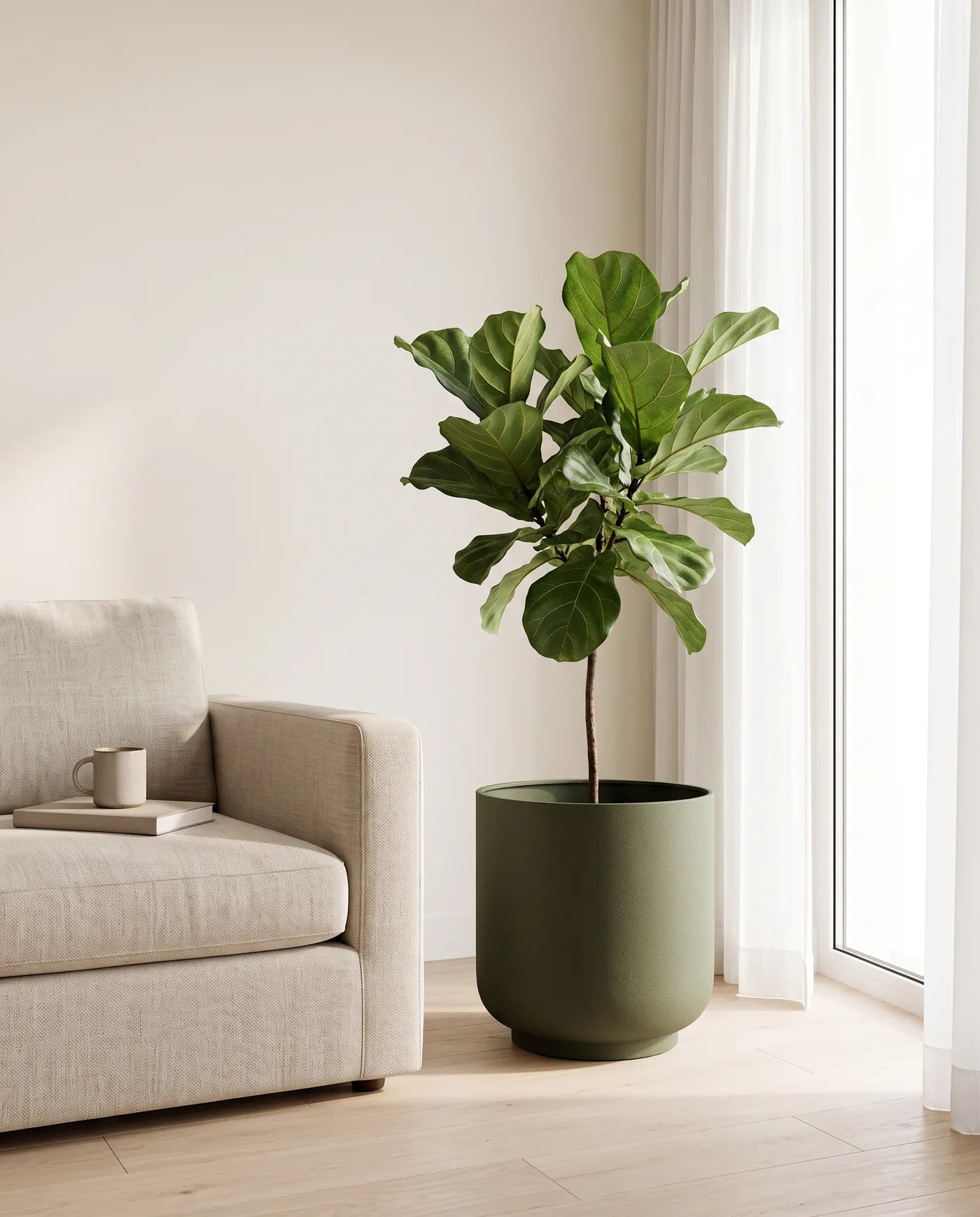 Classic Leather planter with a living plant in a bright, modern room