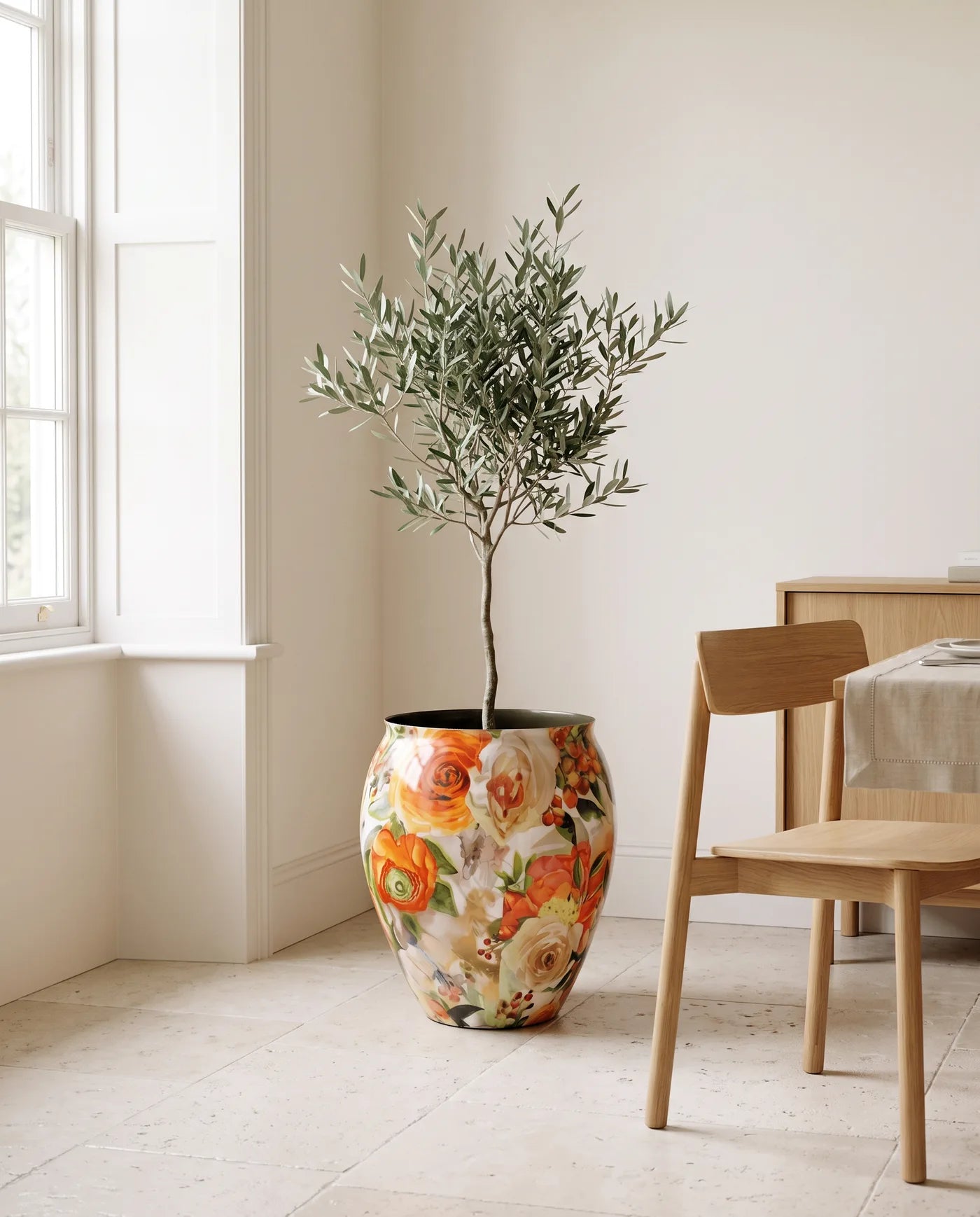 Orange Rose Flora planter with a living plant in a bright, modern room