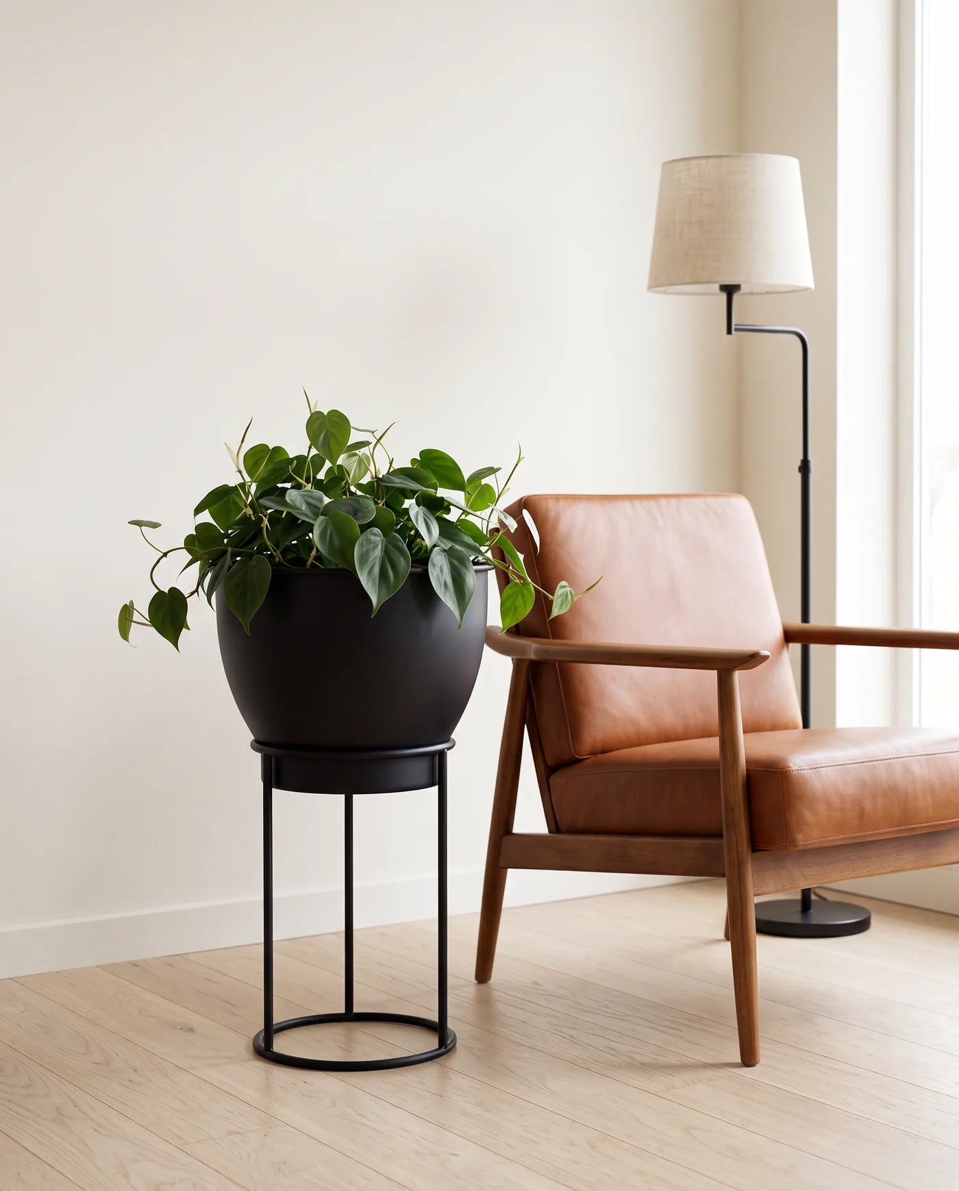Vista With Stand planter with a living plant in a bright, modern room